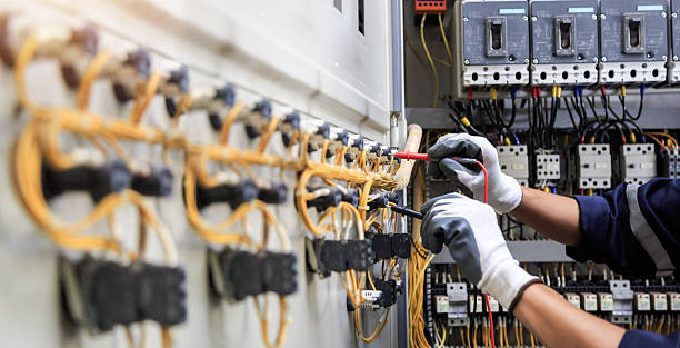 Professional Electrical Panel Upgrade technician working in Chambers County County, TX